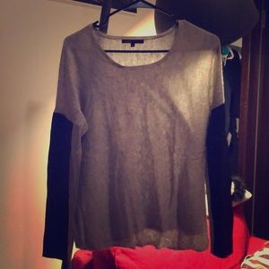 Grey sweater with black leather sleeve. Size 1